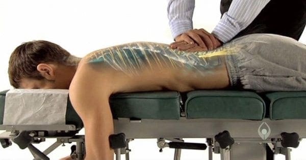 blog picture of man with see through back lying down getting a chiropractic adjustment