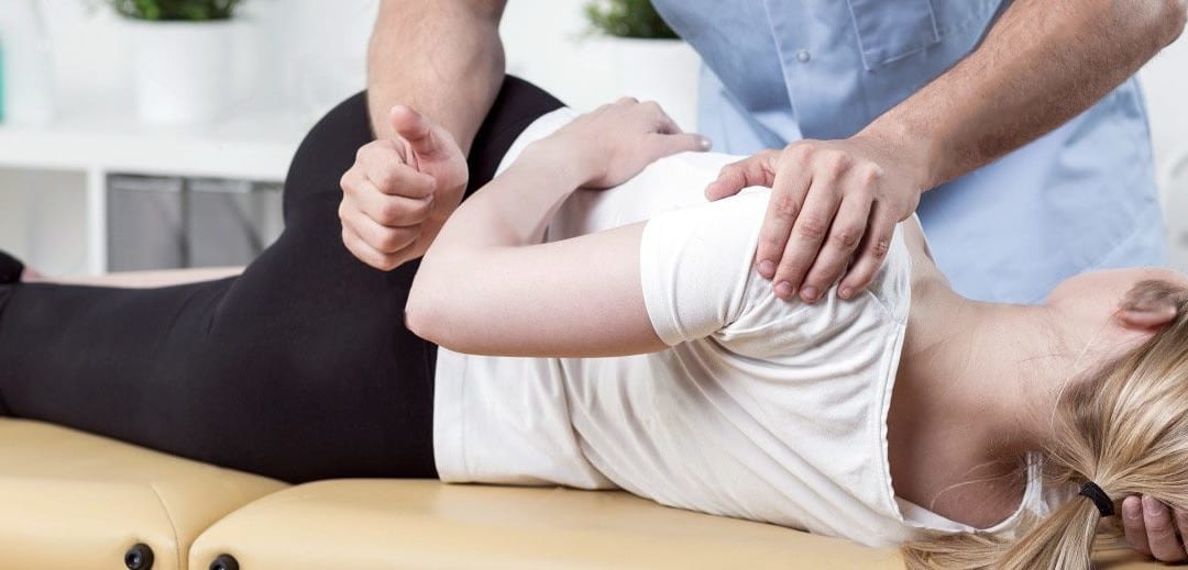 blog picture of chiropractor working on a lady