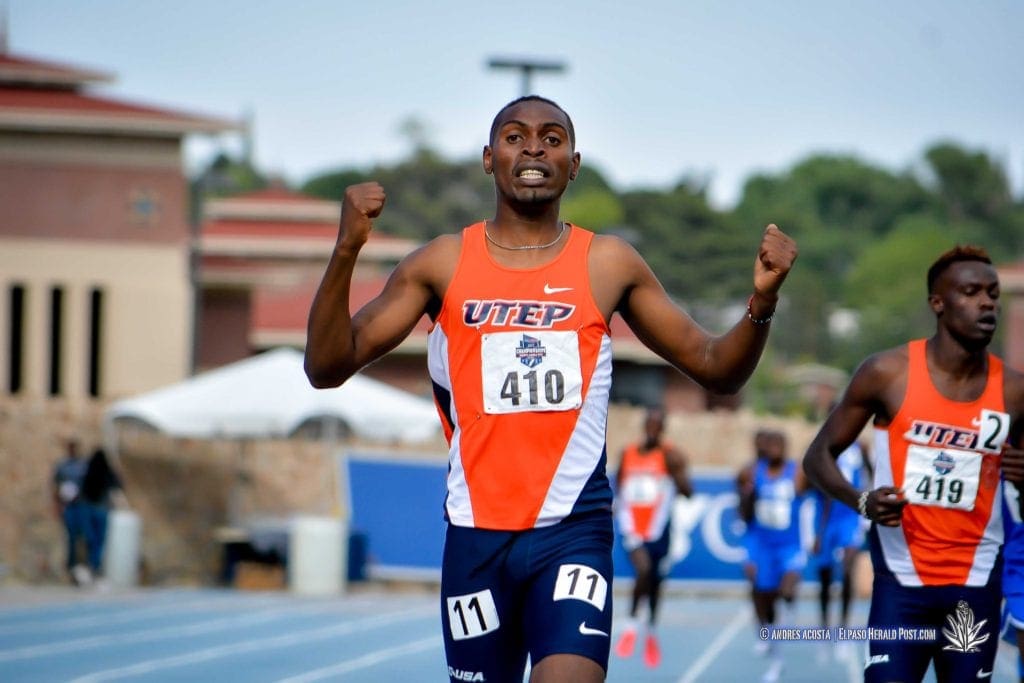 UTEP's Jonah Koech (#410) raises his hands in vitcory in the Men's 800 meter dash at the 2017 CUSA Track and field meet, Finals Kidd Field El Paso Texas