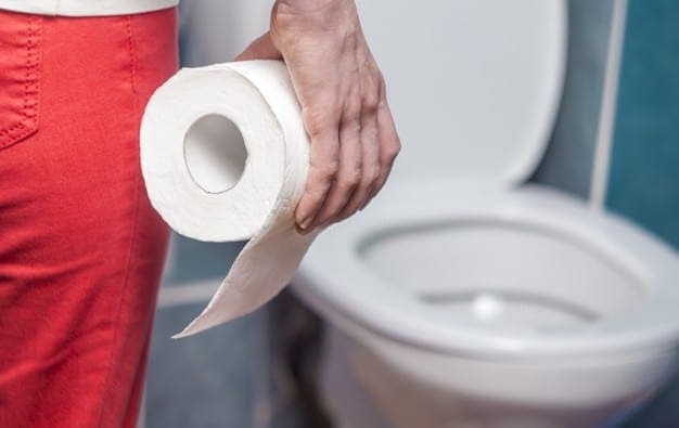 woman-is-holding-toilet-paper-concept-diarrhea-constipation_8119-1107